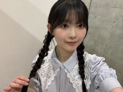 水色のリュックを背負ってのサムネイル